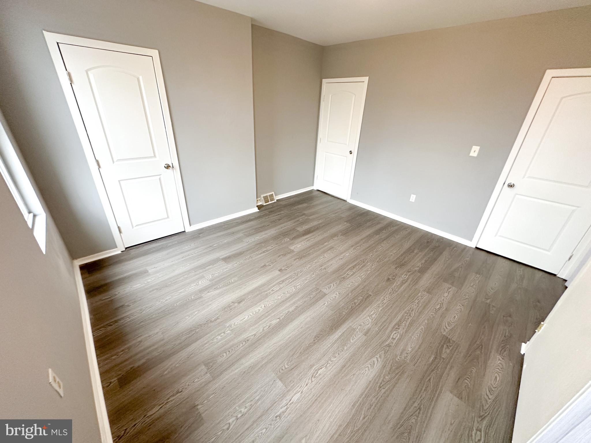 330 North 53rd Street Philadelphia, PA 19139 - Photo 10 of 20 wooden floor in an empty room with a window