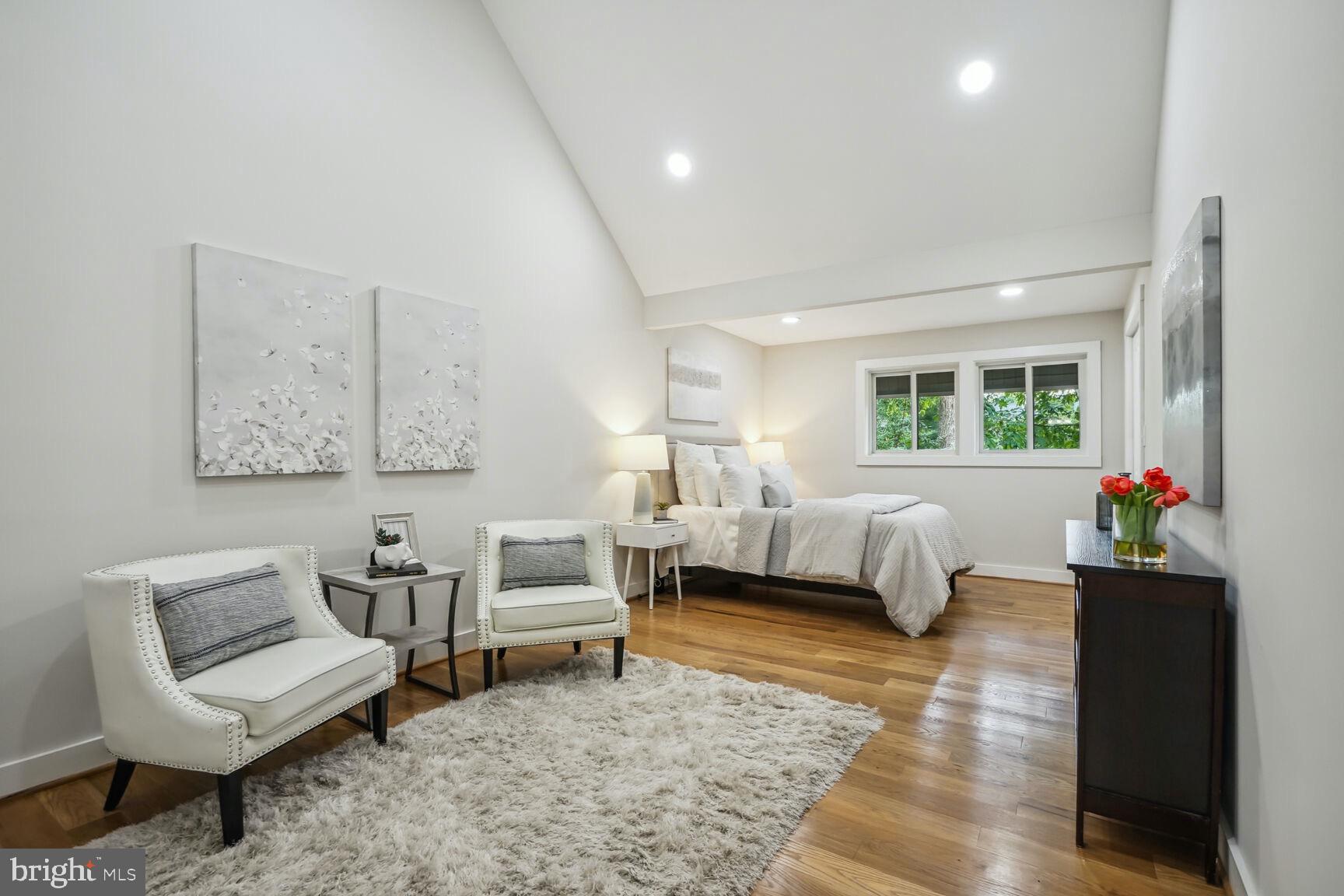 2215 Burgee Court Reston, VA 20191 - Photo 22 of 41 Upper level primary bedroom with vaulted ceiling