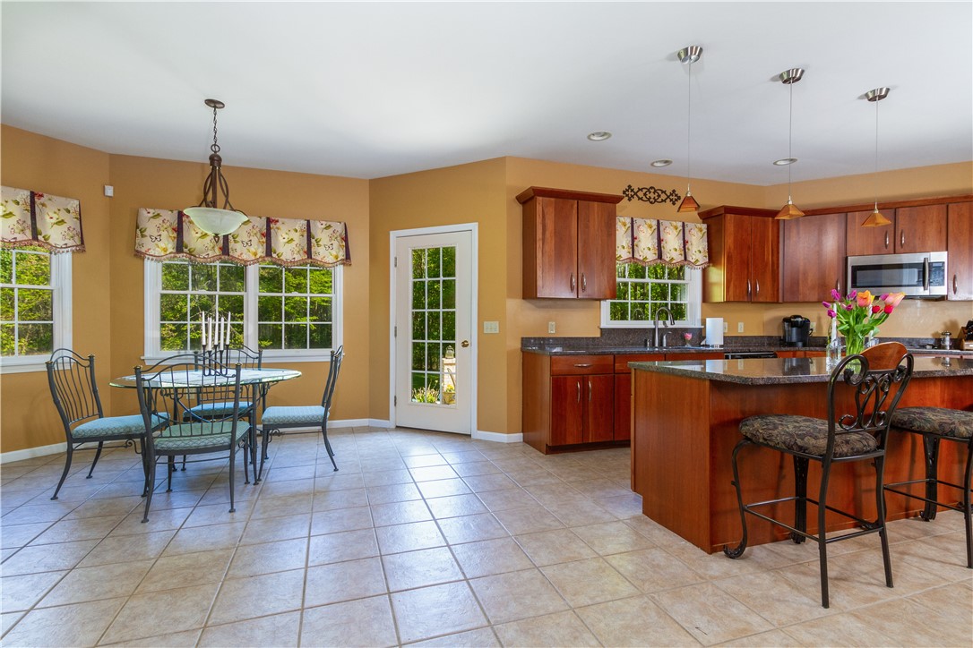 401 Laten Knight Road Cranston, RI 02921 - Photo 18 of 49 Large, bright, and open eat in kitchen