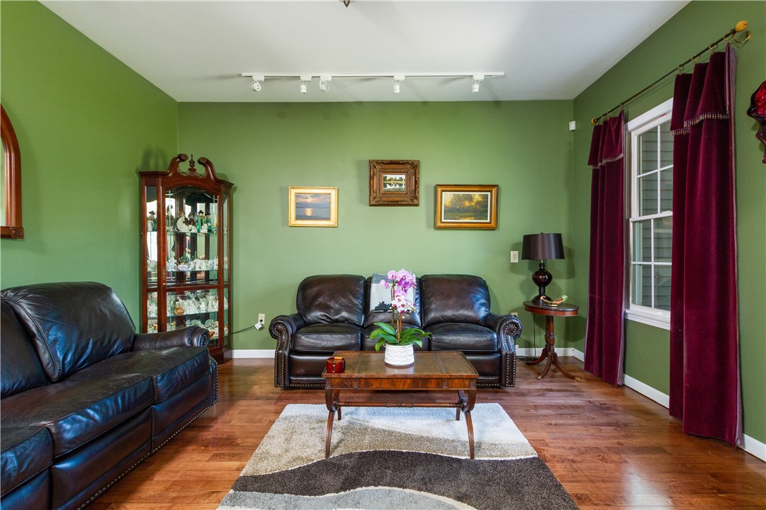 401 Laten Knight Road Cranston, RI 02921 - Photo 20 of 49 Family room with hardwood floors