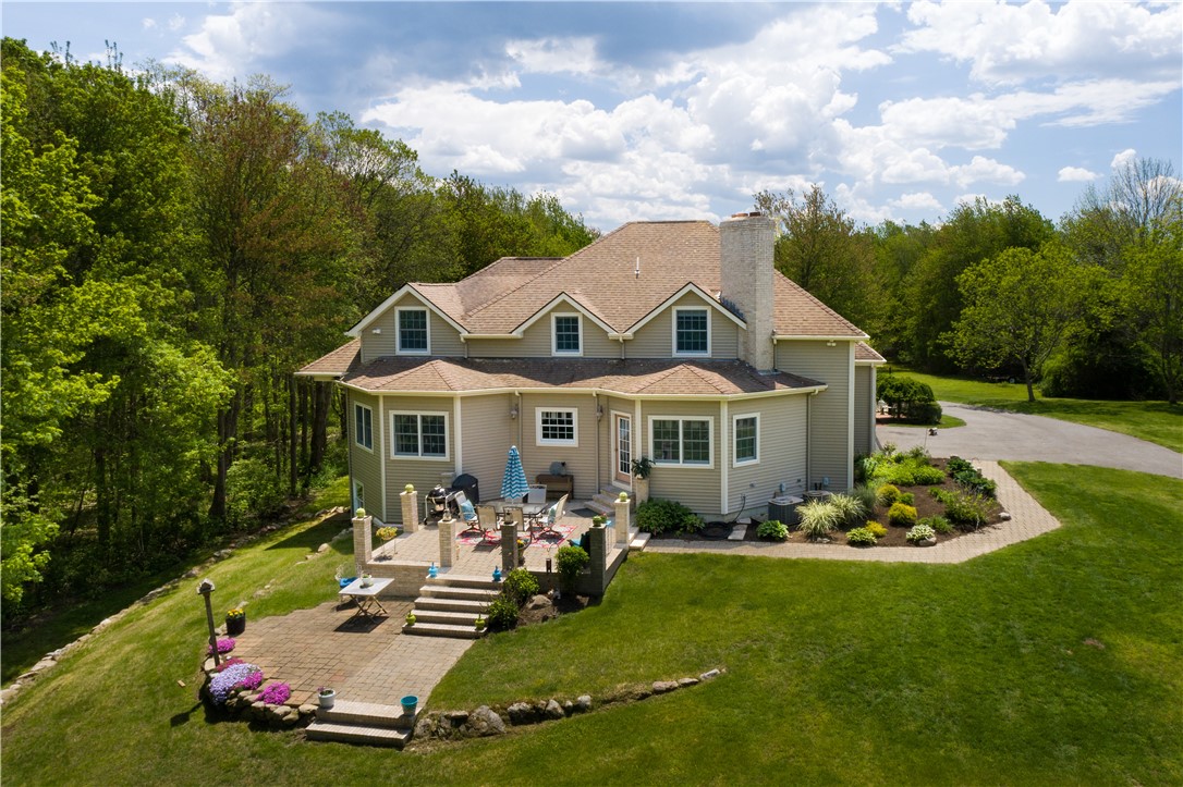 401 Laten Knight Road Cranston, RI 02921 - Photo 38 of 49 Expansive and sunny rear patio