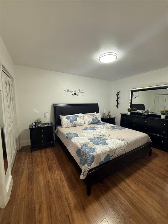 112 Lagoon Road Winter Haven, FL 33884 - Photo 12 of 21 a bedroom with a bed and a dresser
