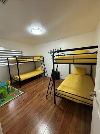 a bedroom with bunk bed