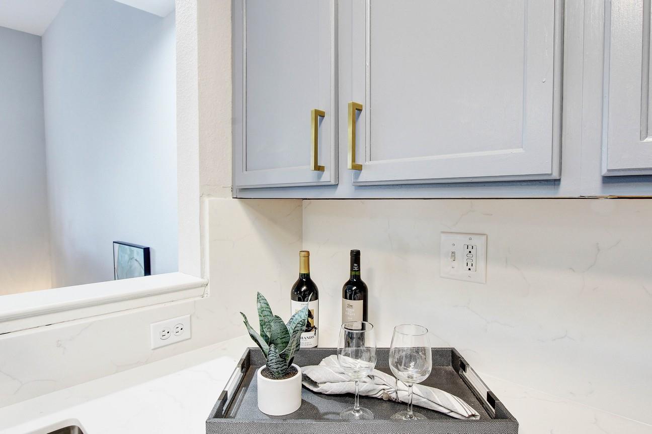 128 Orsi Circle San Francisco, CA 94124 - Photo 18 of 40 a bathroom with a sink and a mirror