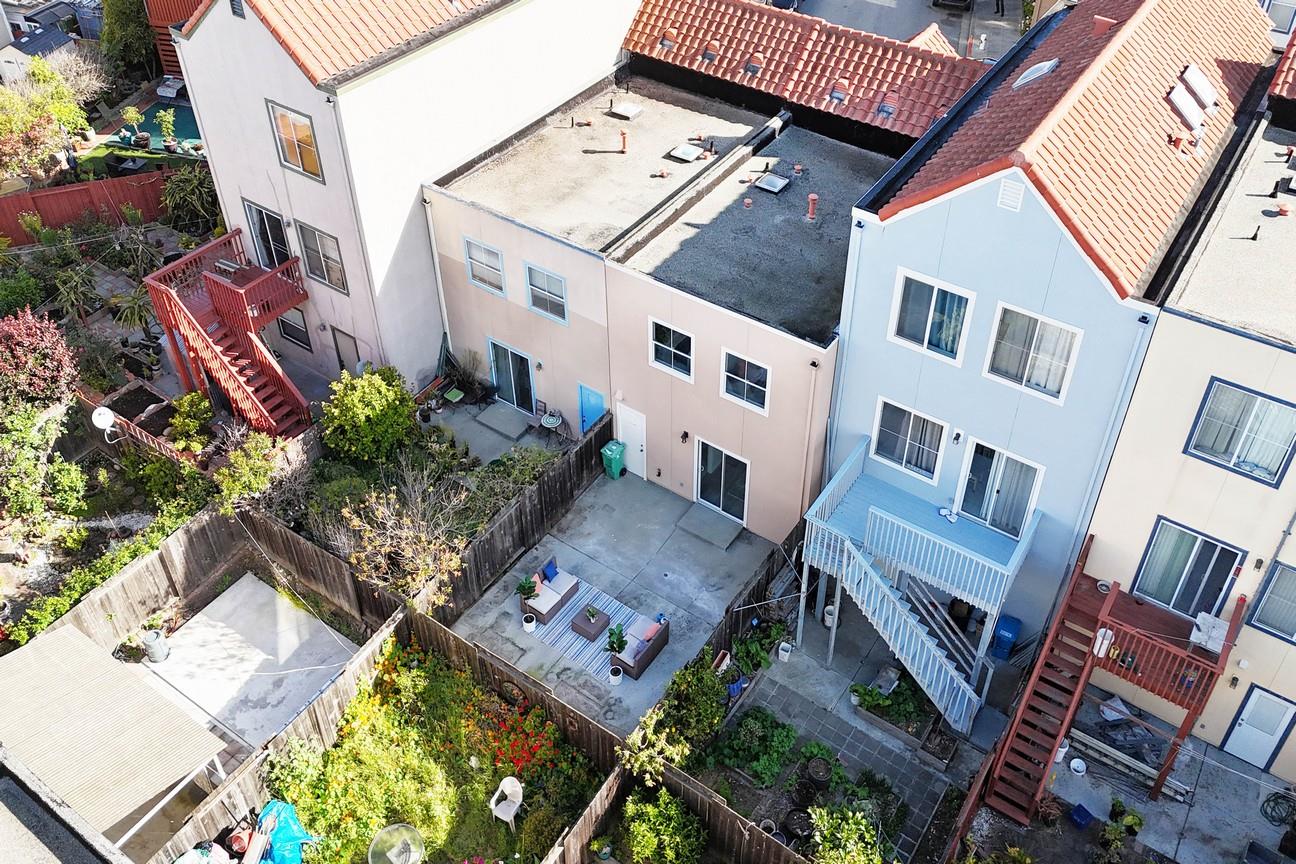 128 Orsi Circle San Francisco, CA 94124 - Photo 40 of 40 front view of a building with many windows