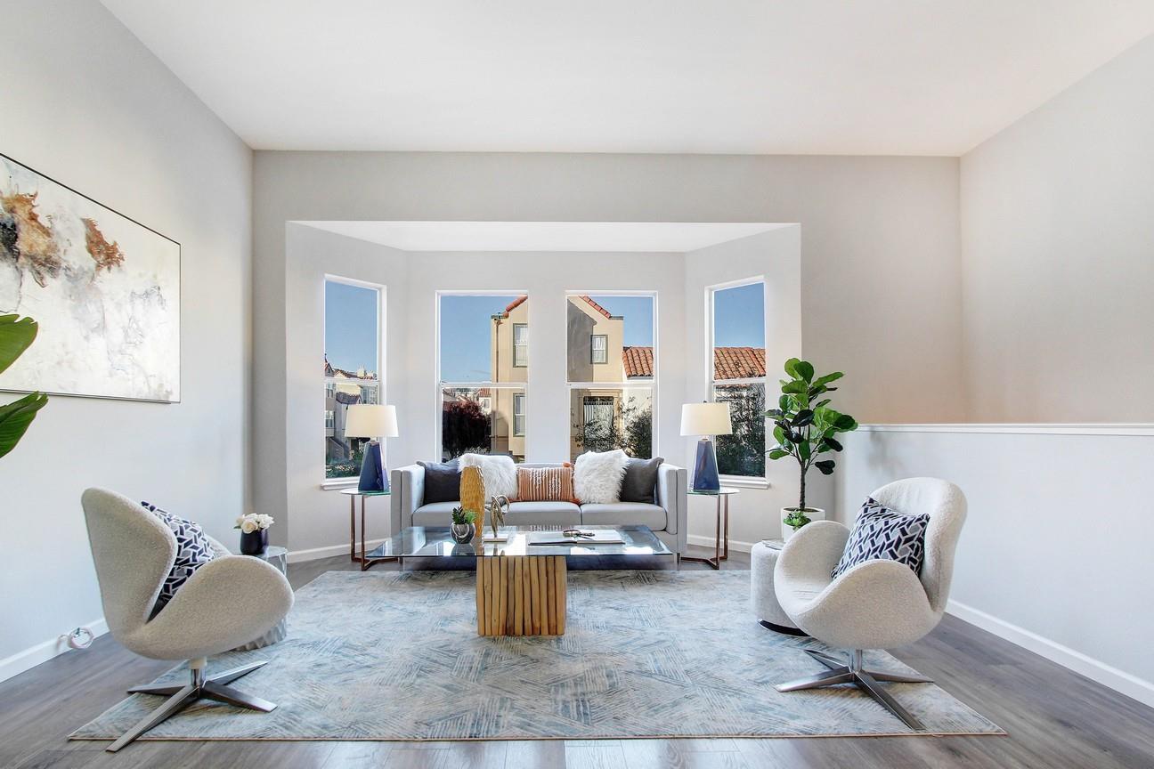 128 Orsi Circle San Francisco, CA 94124 - Photo 6 of 40 a living room with furniture and a potted plant
