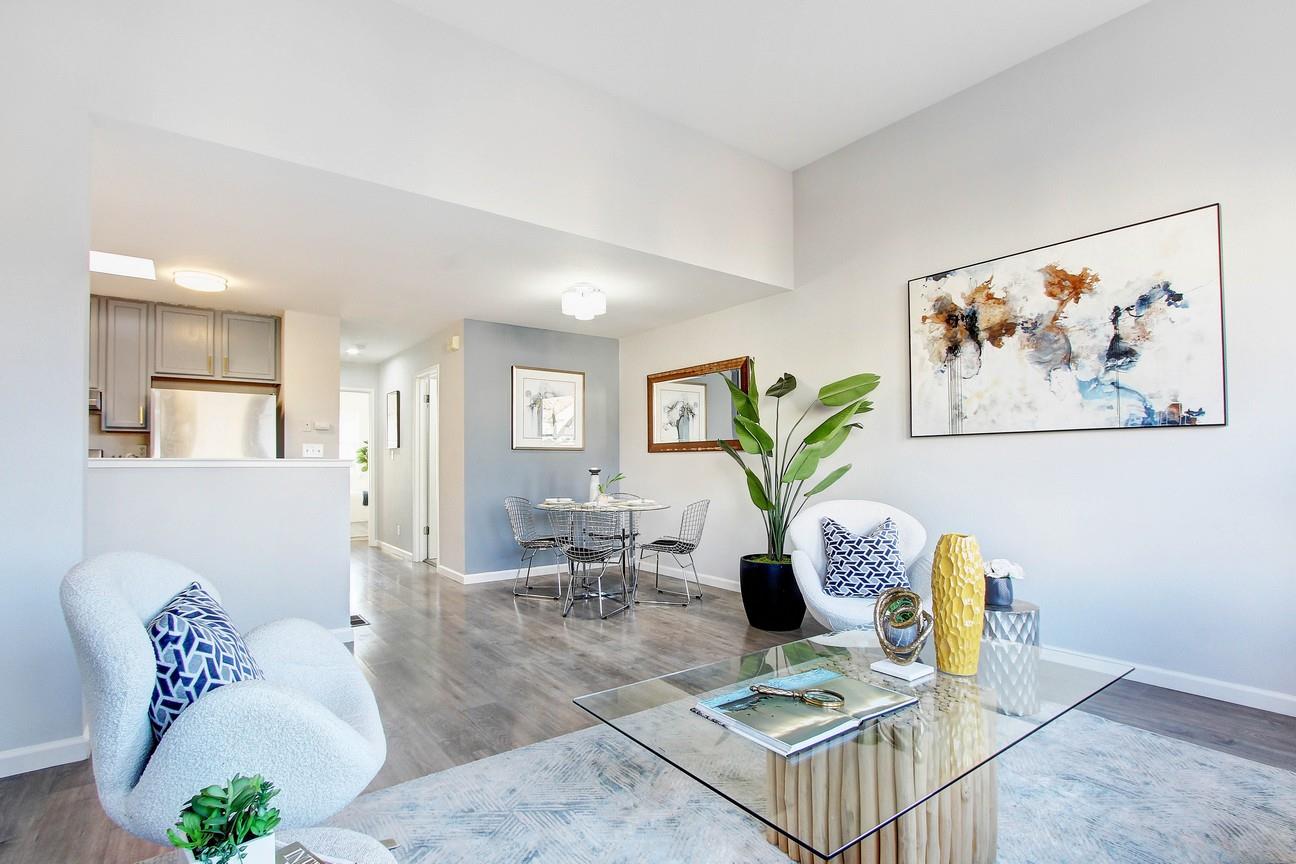 128 Orsi Circle San Francisco, CA 94124 - Photo 10 of 40 a living room with furniture and wooden floor