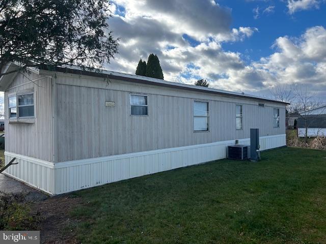 323 Benning Avenue Gettysburg, PA 17325 - Photo 3 of 29 a view of backyard with barbeque grill potted plants and ceiling fan