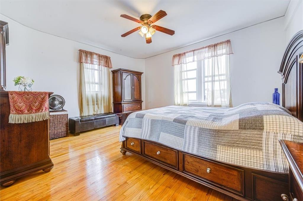 601 79th Street, Unit D11 Brooklyn, NY 11209 - Photo 9 of 19 a spacious bedroom with a bed and window