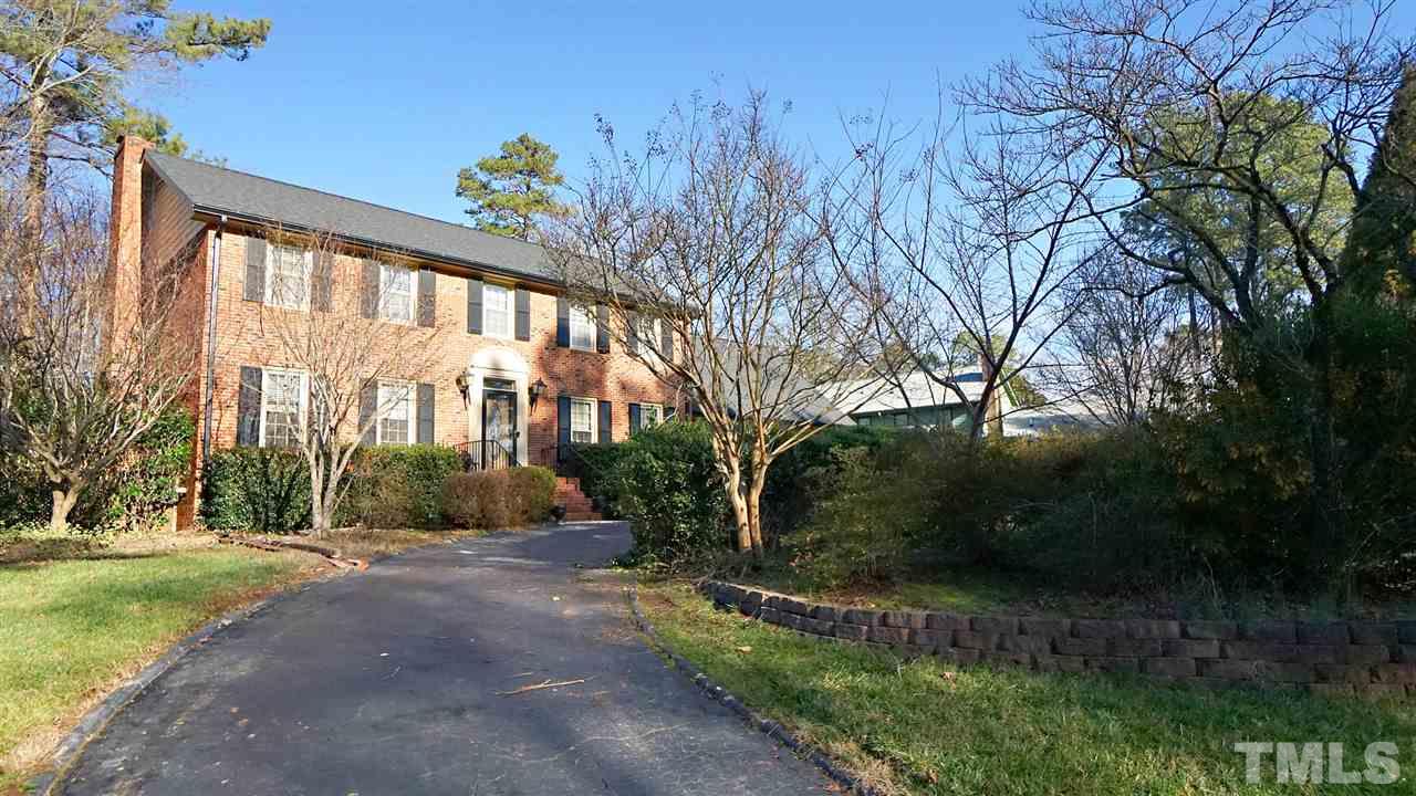 1809 Pony Run Road Raleigh, NC 27615 - Photo 1 of 30 a view of a garden with a house