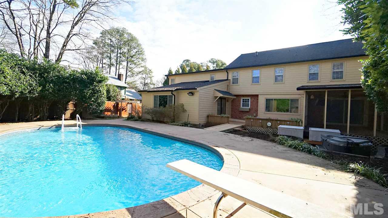 1809 Pony Run Road Raleigh, NC 27615 - Photo 3 of 30 a view of a house with backyard and sitting area