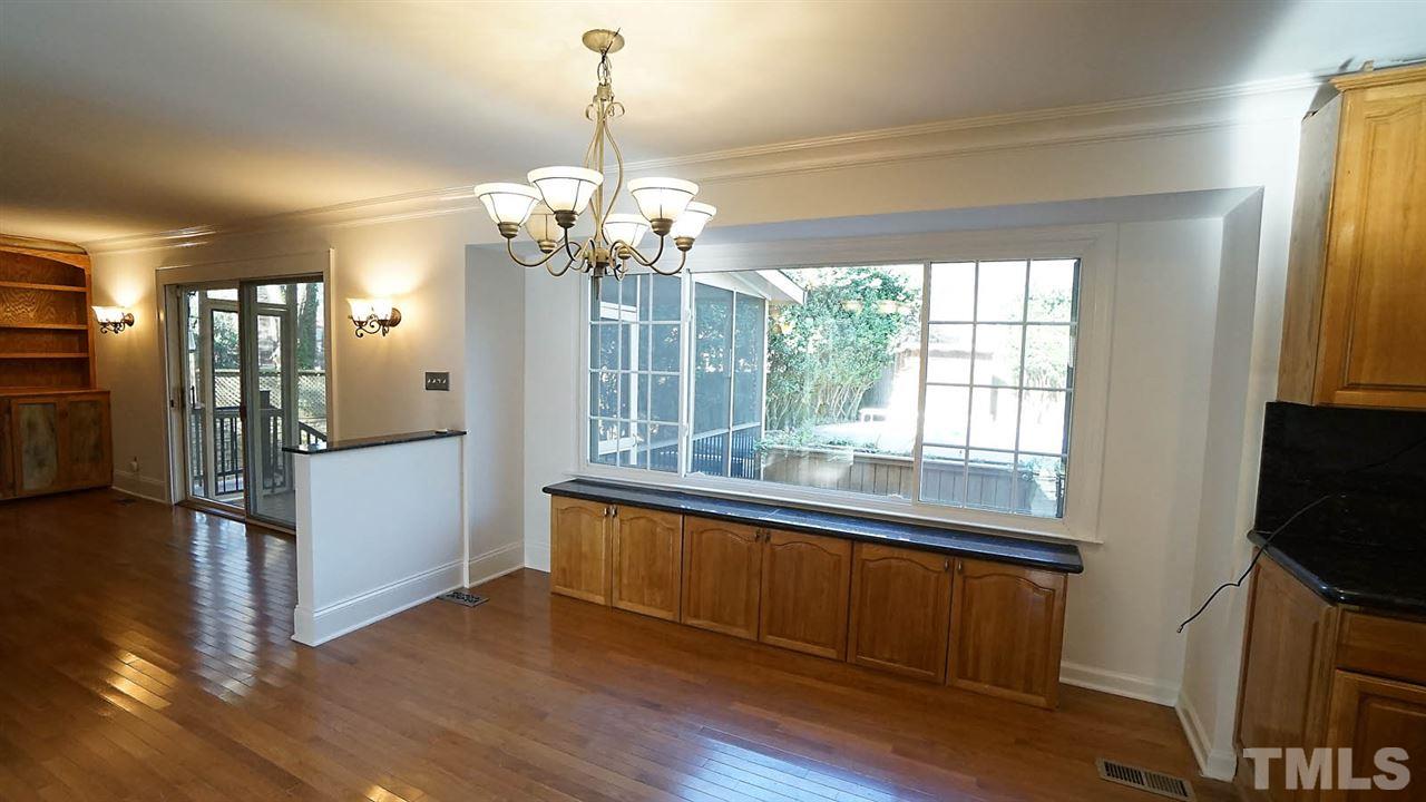 1809 Pony Run Road Raleigh, NC 27615 - Photo 29 of 30 a view of a livingroom with a chandelier