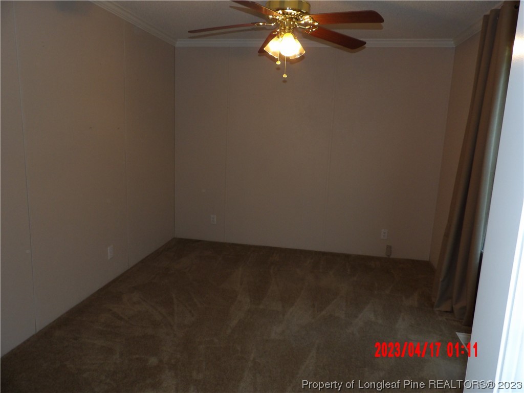 7349 Roslin Farm Road Hope Mills, NC 28348 - Photo 14 of 23 a view of a room with a fan