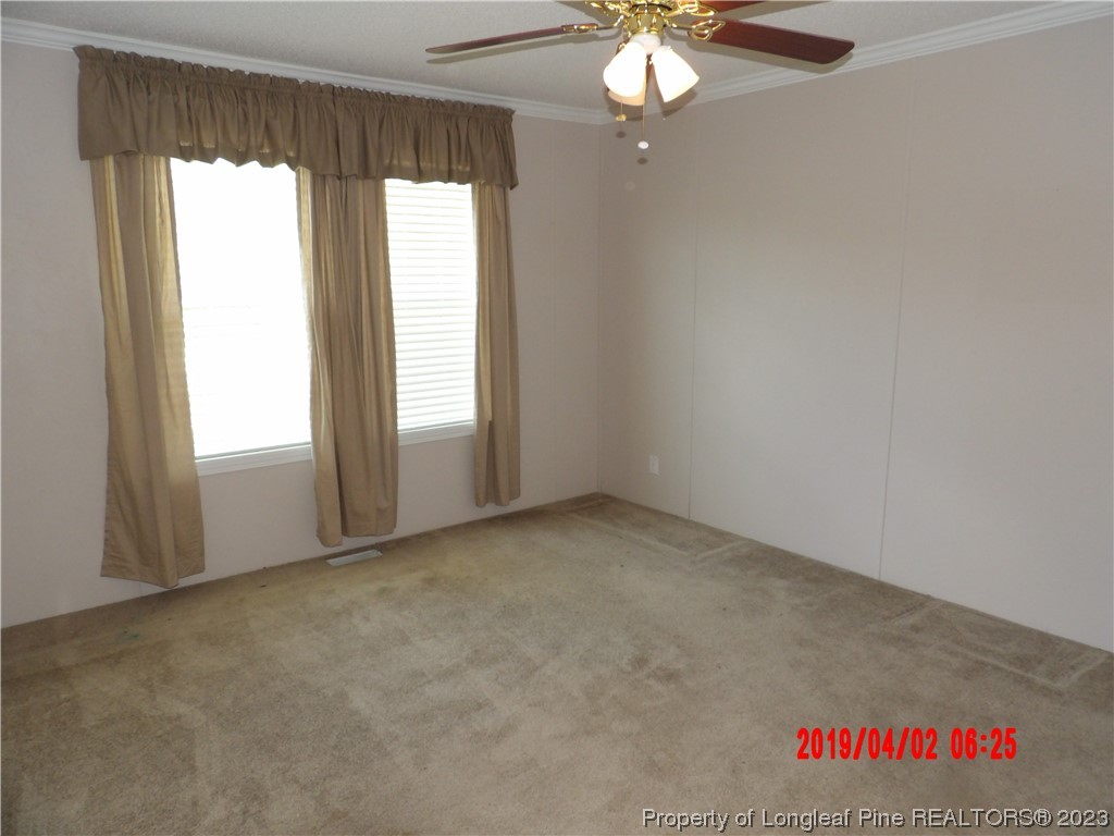 7349 Roslin Farm Road Hope Mills, NC 28348 - Photo 10 of 23 an empty room with a window
