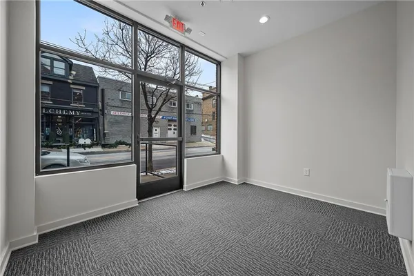 a view of a room with racks on the wall