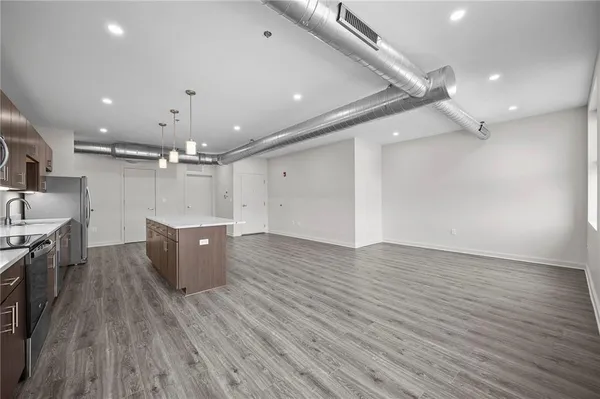 a view of kitchen and natural light