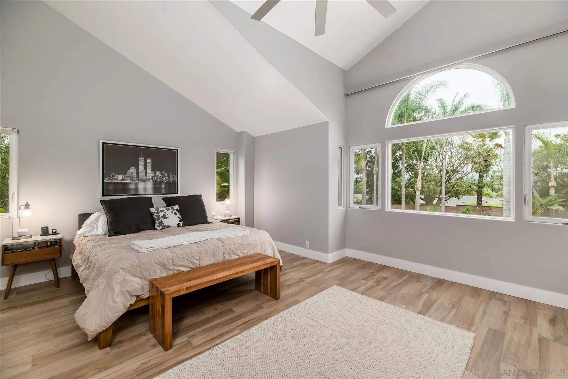 815 Marisa Lane Encinitas, CA 92024 - Photo 20 of 41 a bedroom with a bed and a large window