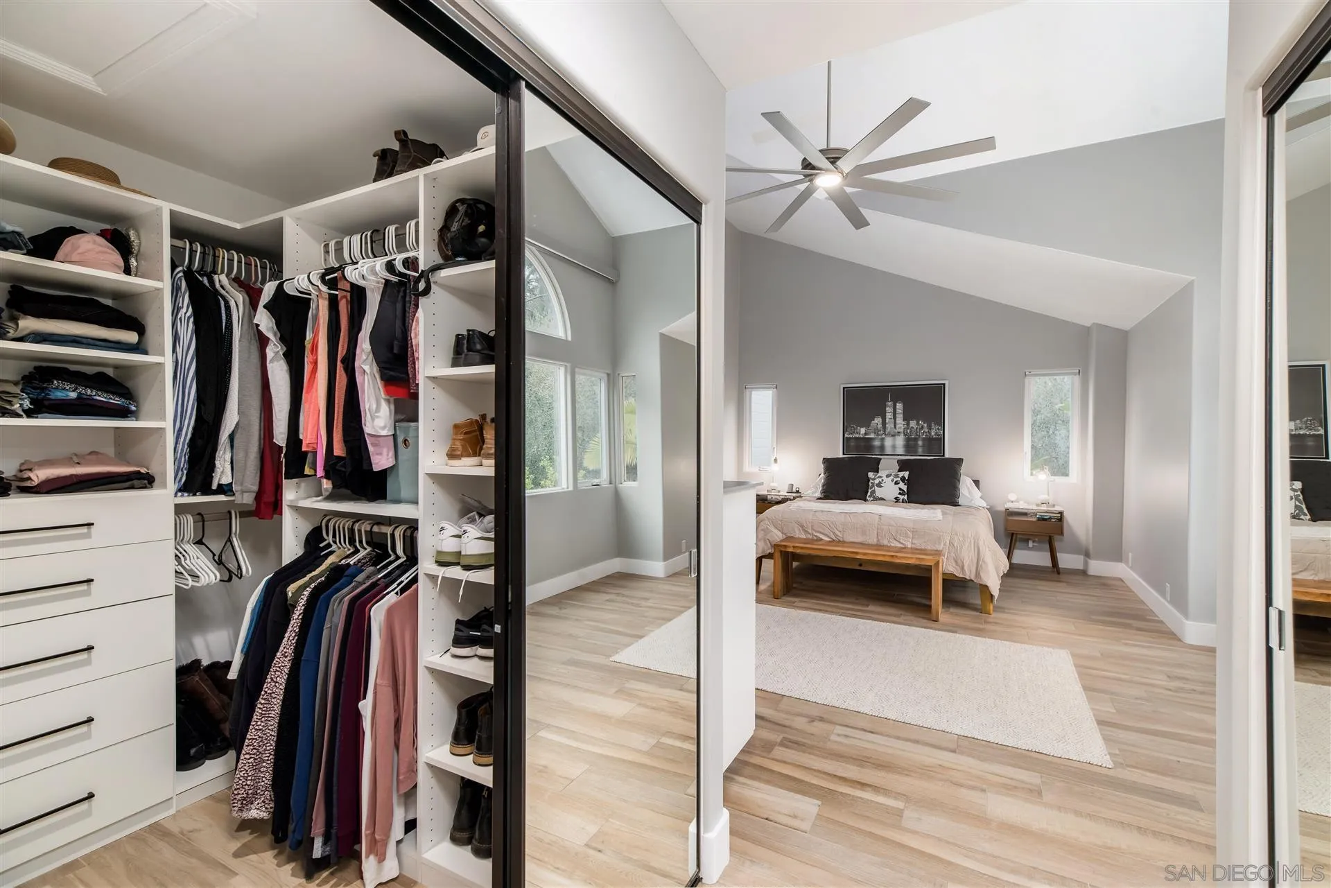 815 Marisa Lane Encinitas, CA 92024 - Photo 24 of 41 a view of walk in closet with clothes and shoes