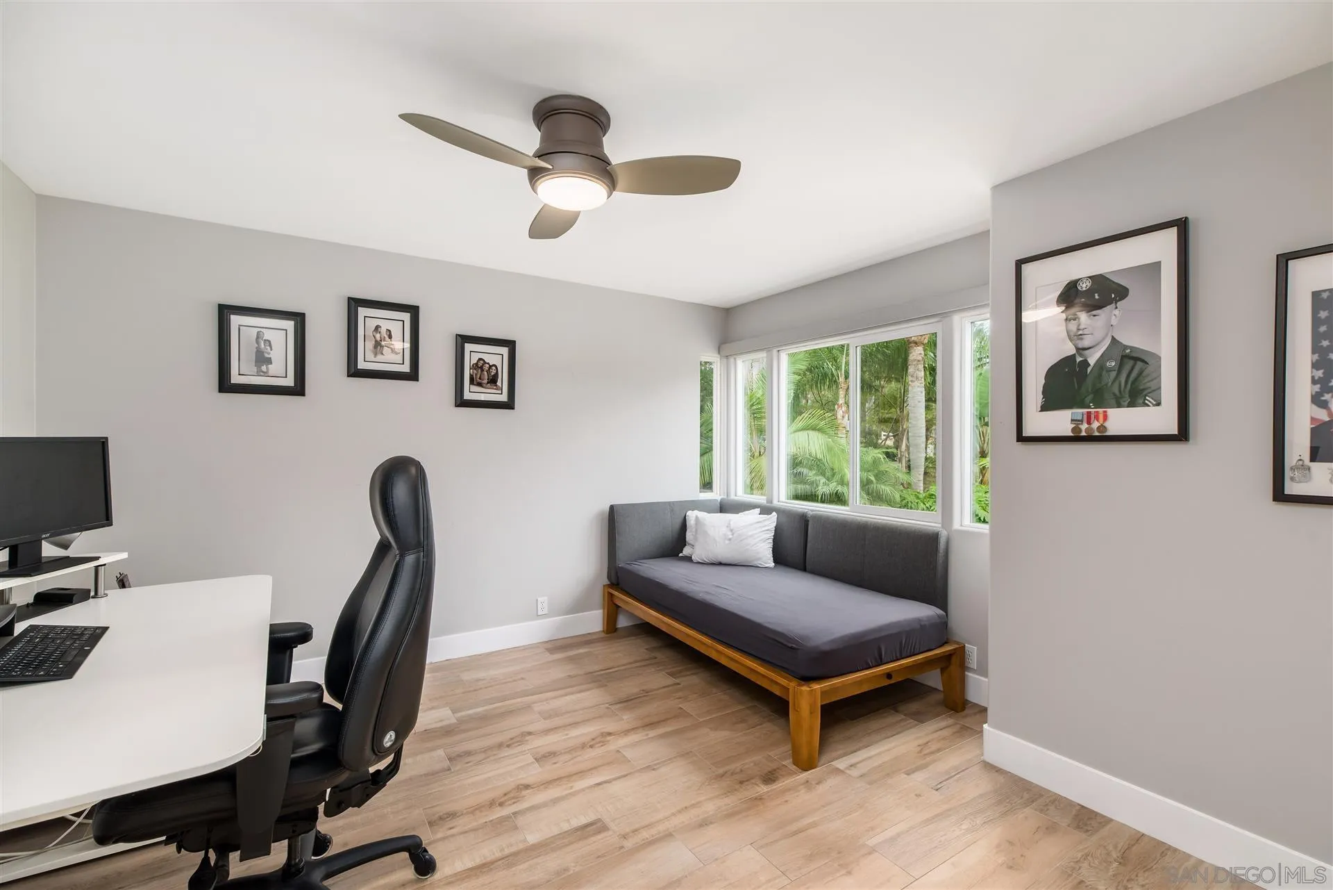815 Marisa Lane Encinitas, CA 92024 - Photo 25 of 41 a living room with furniture and a window