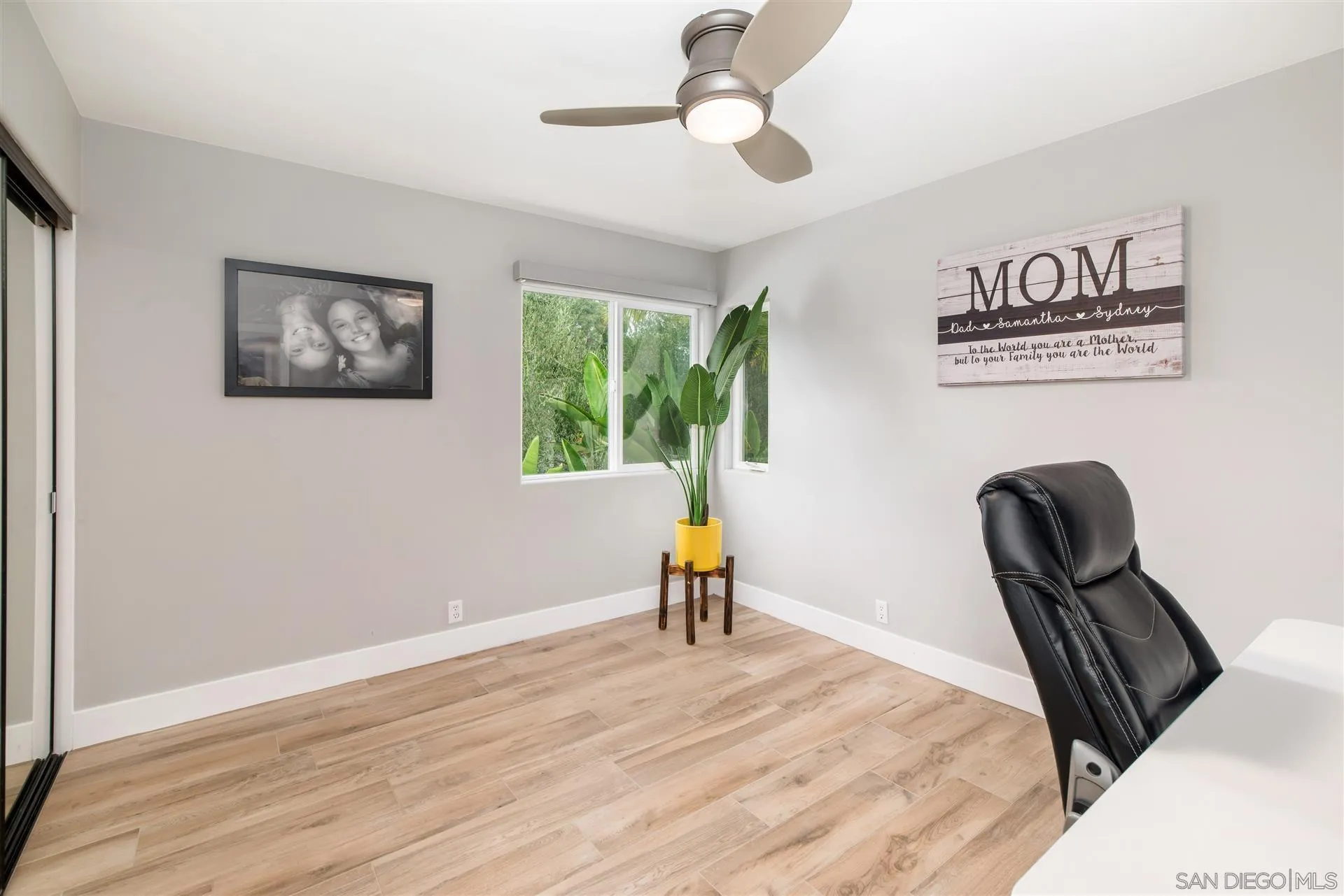 815 Marisa Lane Encinitas, CA 92024 - Photo 28 of 41 a view of a workspace with furniture and a window