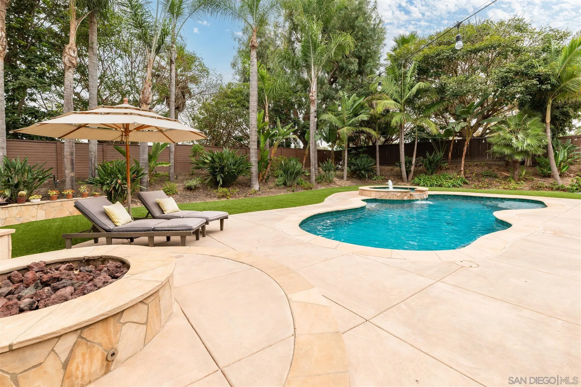 815 Marisa Lane Encinitas, CA 92024 - Photo 30 of 41 a view of a swimming pool with a patio and a garden