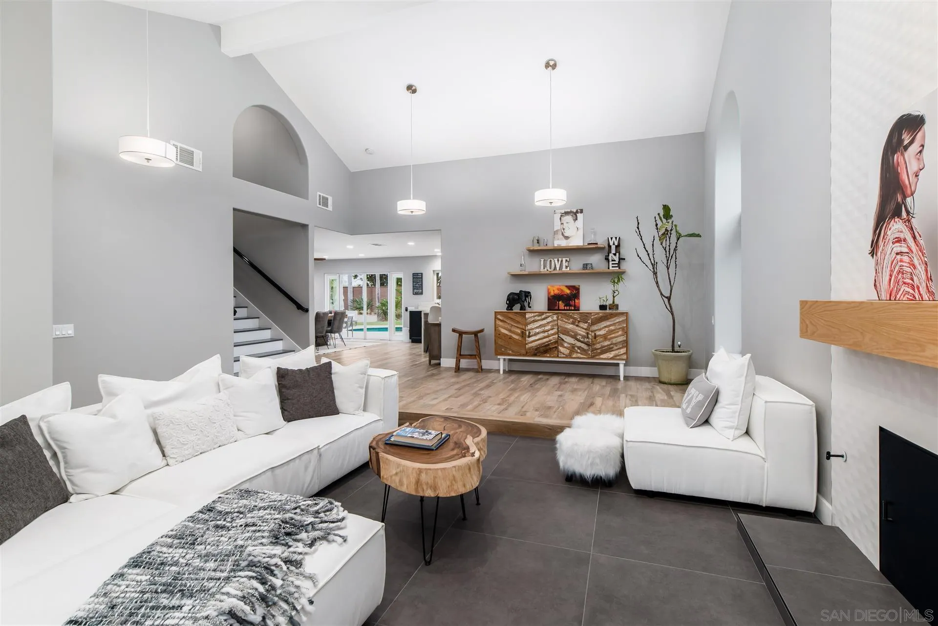 815 Marisa Lane Encinitas, CA 92024 - Photo 7 of 41 a living room with furniture and a couch