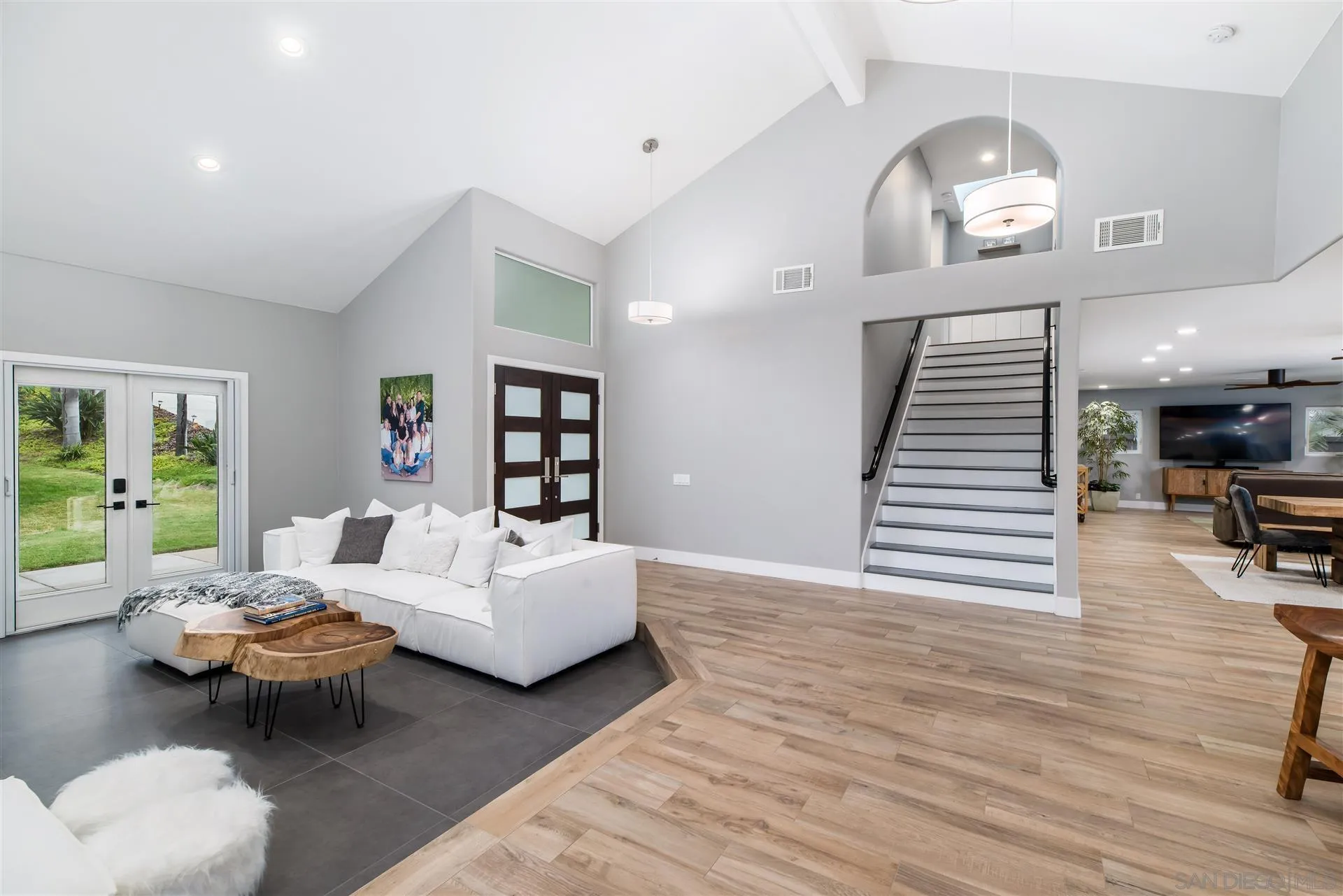 815 Marisa Lane Encinitas, CA 92024 - Photo 8 of 41 a living room with furniture and a wooden floor