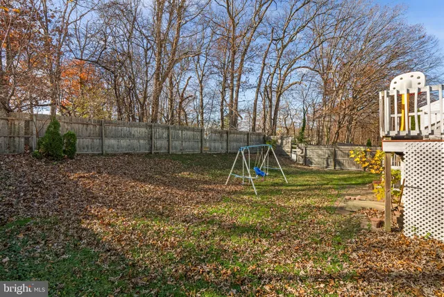 a view of a yard in front of a house
