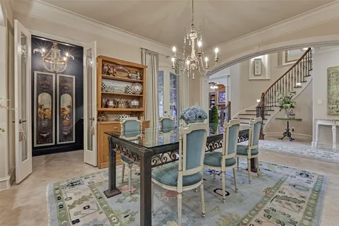 a view of a livingroom with furniture and chandelier