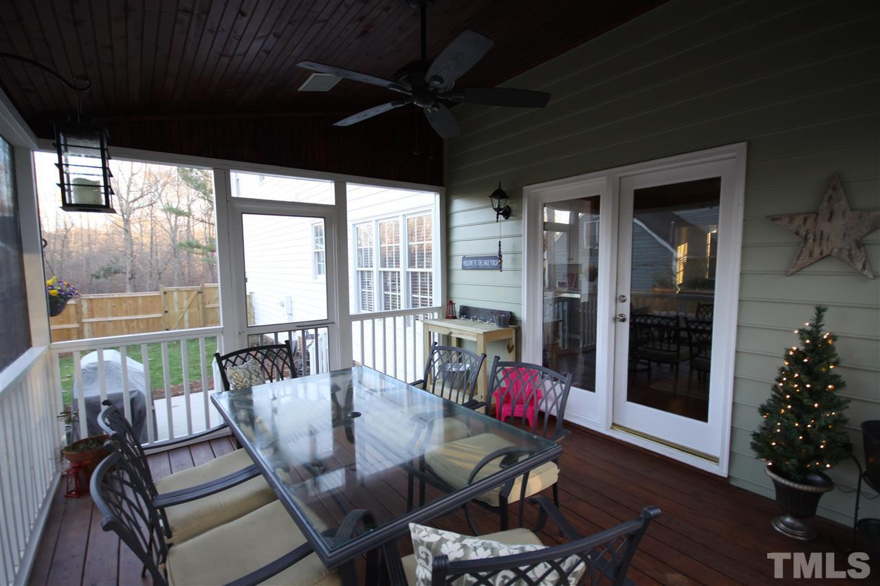 10001 Kilnstone Lane Raleigh, NC 27613 - Photo 9 of 9 Screened Porch with new roof and custom speakers Screened Porch