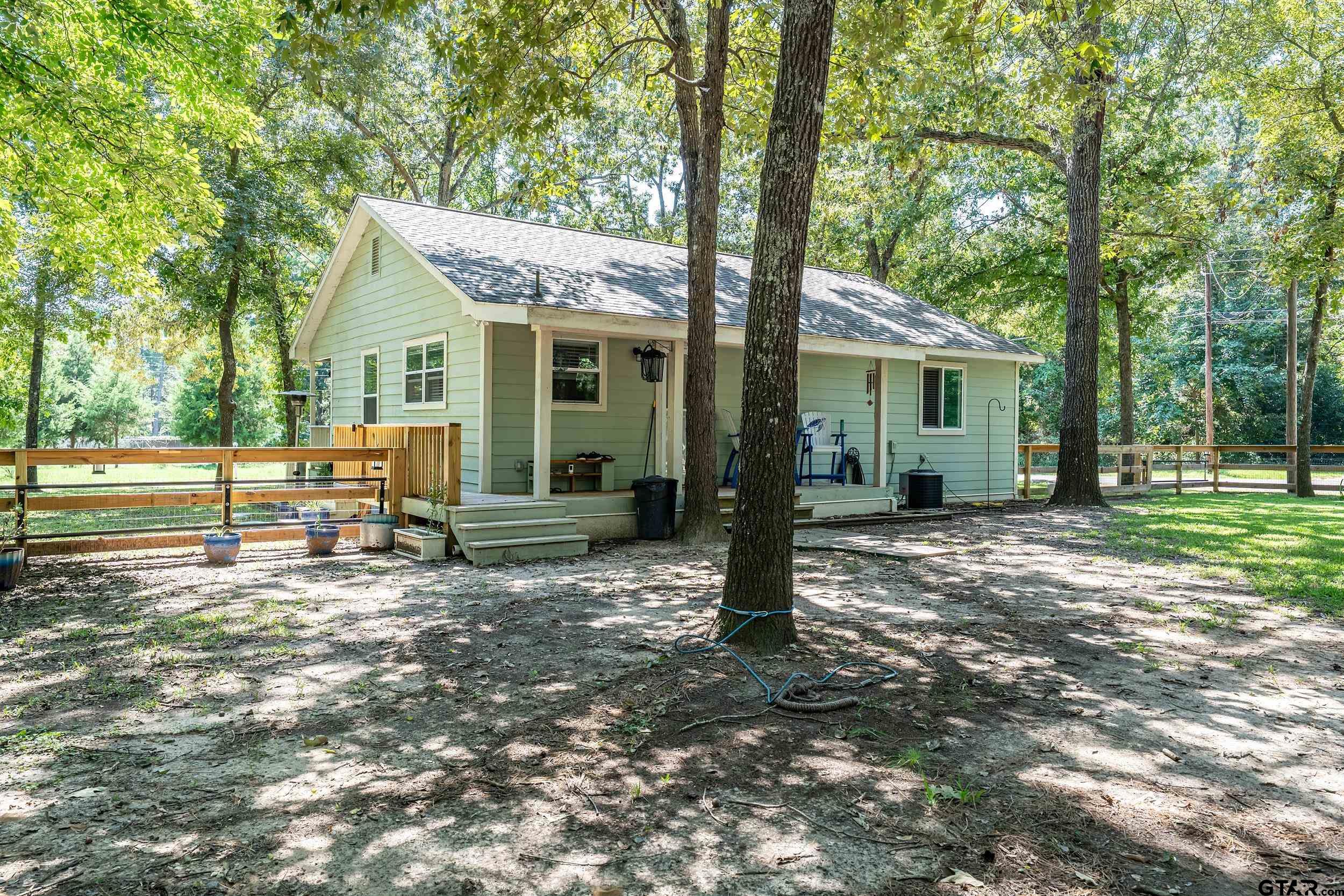 230 Deborah Street Bullard, TX 75757 - Photo 20 of 23 a view of a house with a yard and large tree