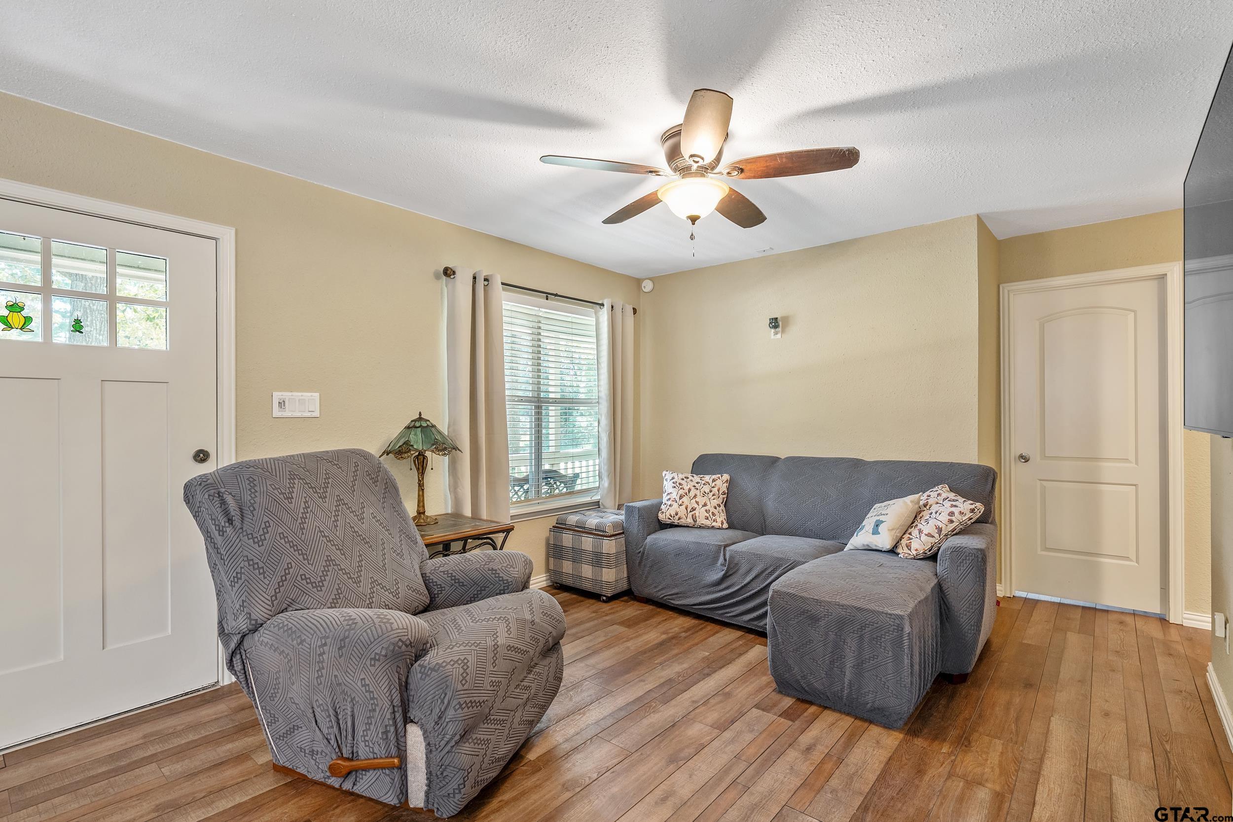 230 Deborah Street Bullard, TX 75757 - Photo 3 of 23 a living room with furniture and a large window
