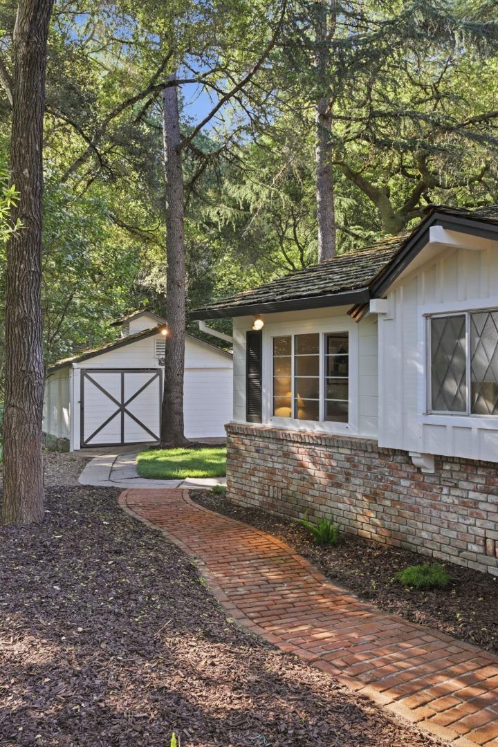 425 Summit Spring Road Woodside, CA 94062 - Photo 37 of 42 a front view of a house with garden