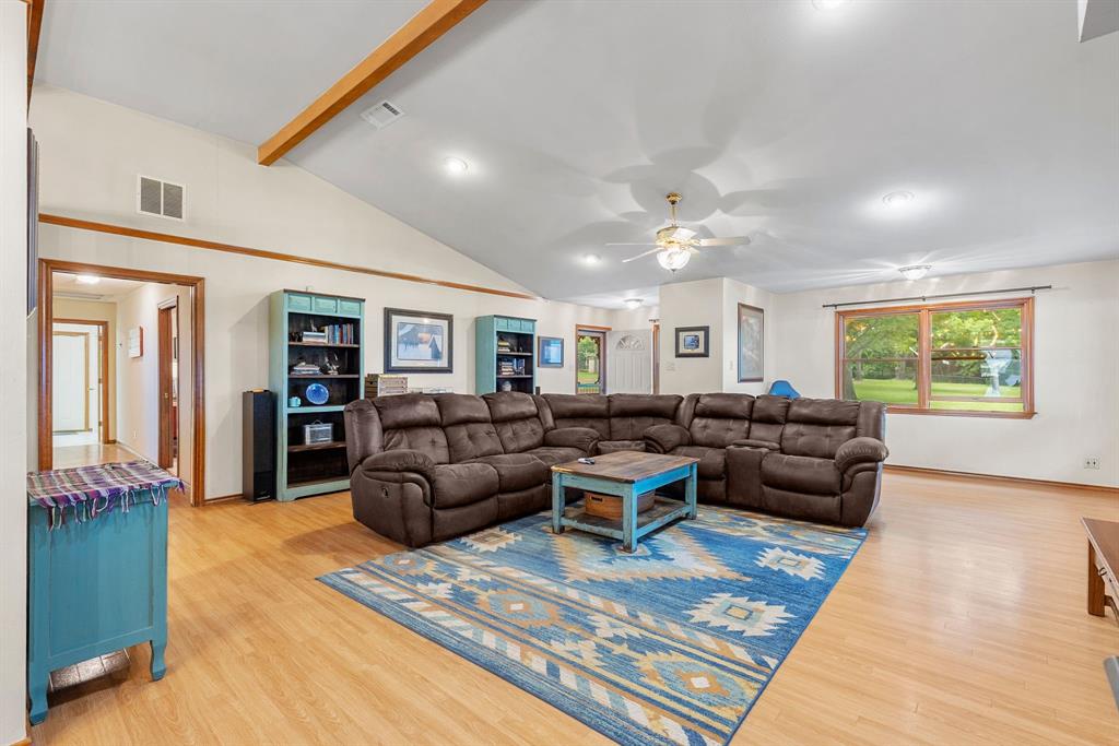 476 Private Road 7326 Emory, TX 75440 - Photo 21 of 33 a living room with furniture and wooden floor