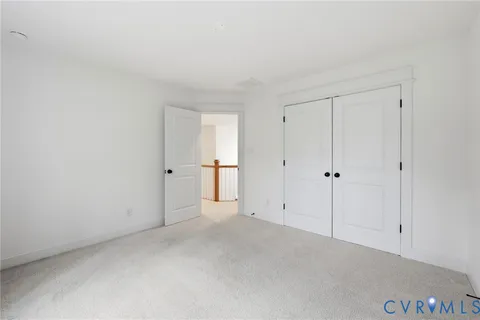 a bathroom with bathtub and window
