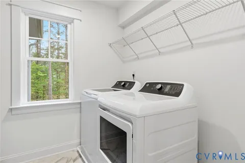 a balcony view with a seating space