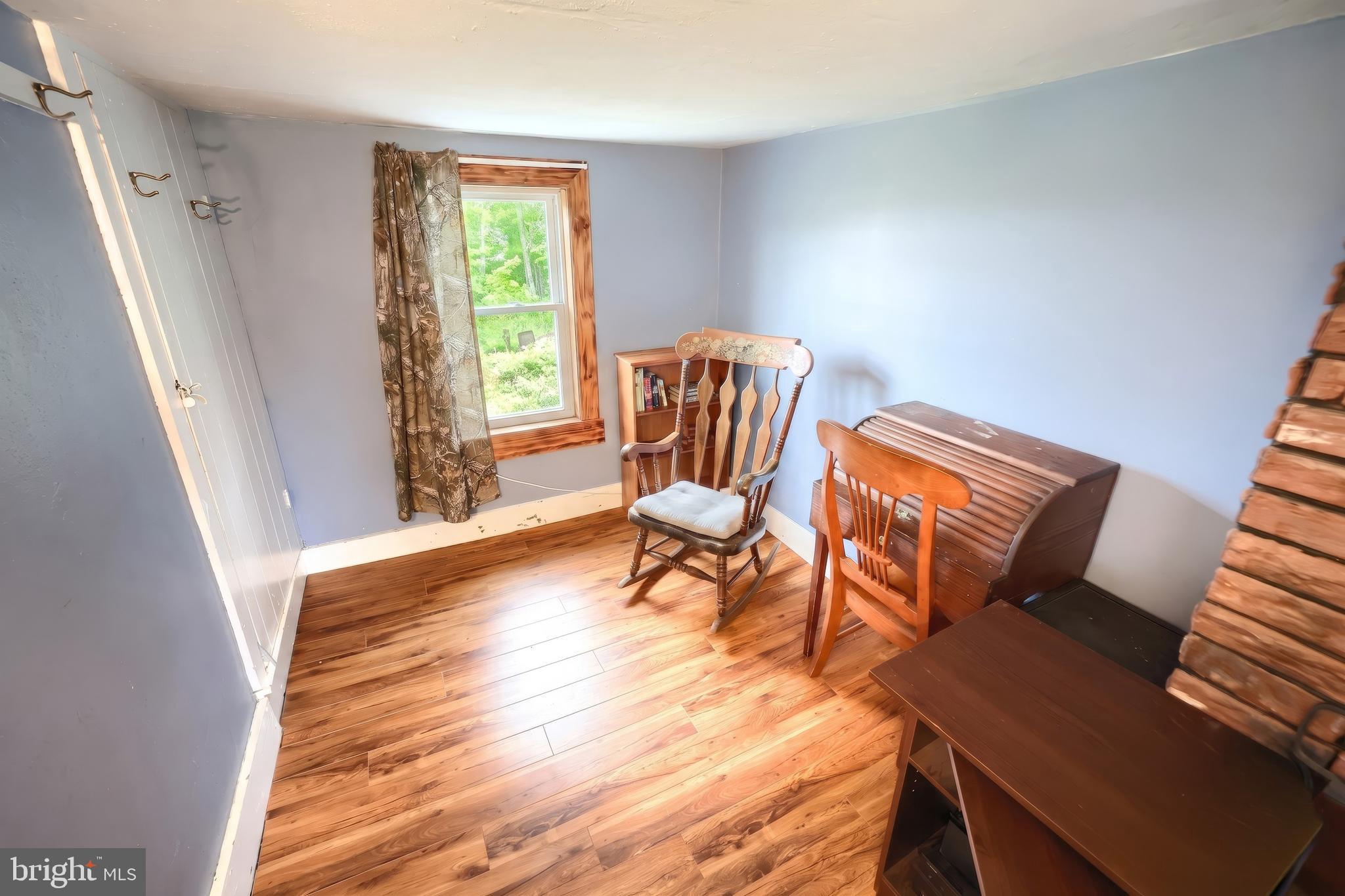 1111 Richmond Road Red Lion, PA 17356 - Photo 30 of 57 a living room with furniture and a window