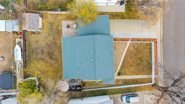a wooden bench sitting in front of a door