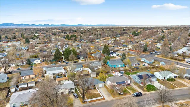 an aerial view of residential building and street