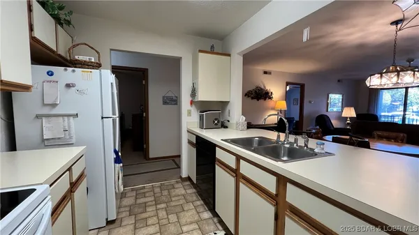 $219,000 | 31313 Northshore Drive, Unit 402D, Rocky Mount, MO 65072