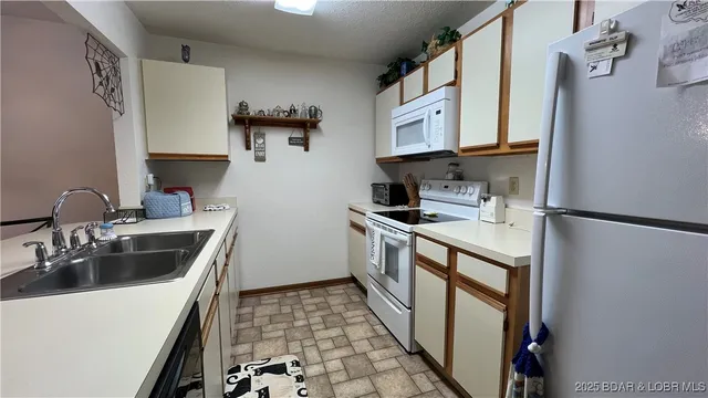 $219,000 | 31313 Northshore Drive, Unit 402D, Rocky Mount, MO 65072