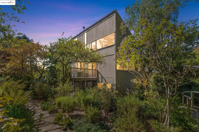 a backyard of a house with lots of green space