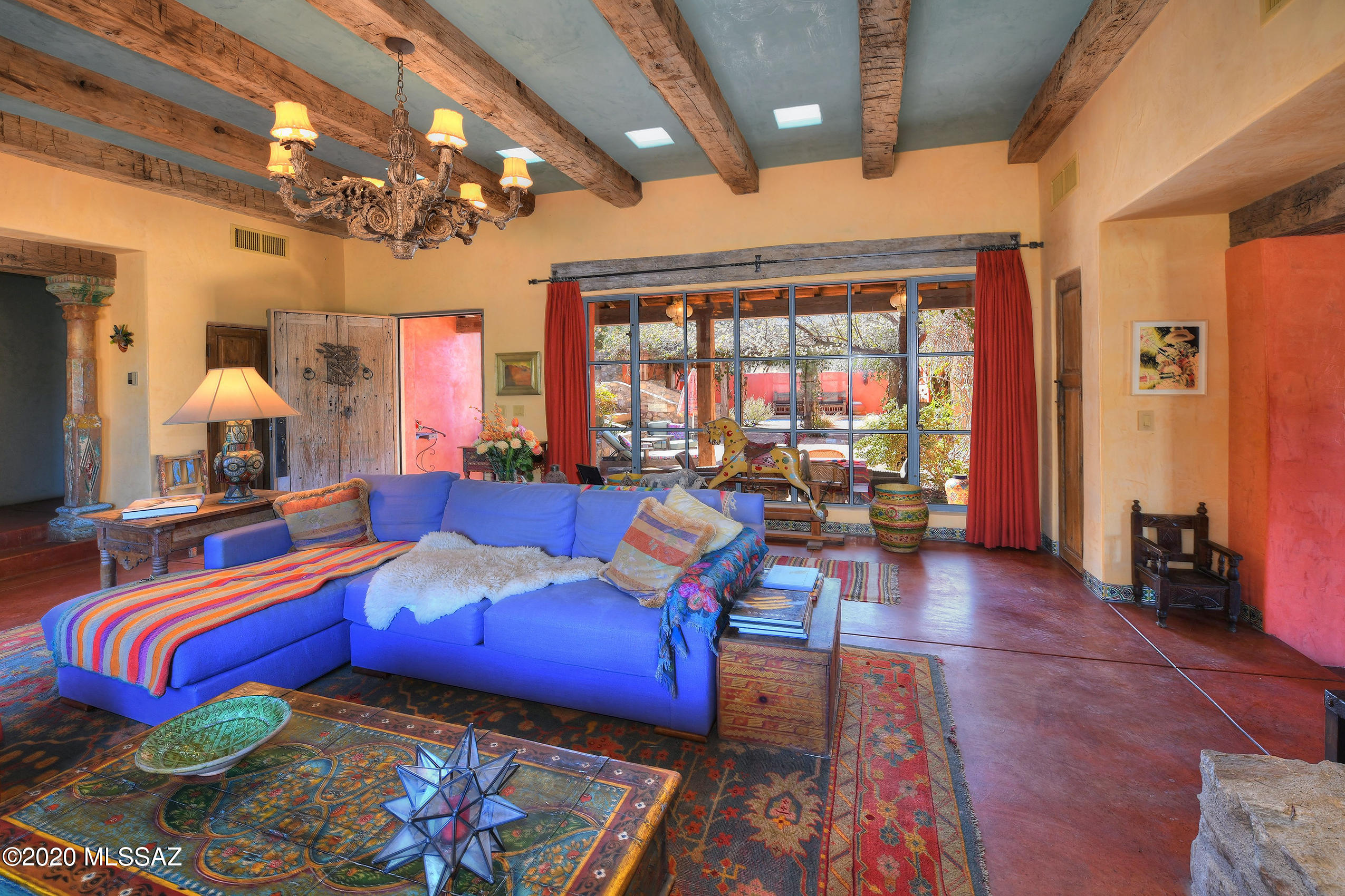360 Harshaw Creek Road Patagonia, AZ 85624 - Photo 19 of 50 a living room with furniture and a large window