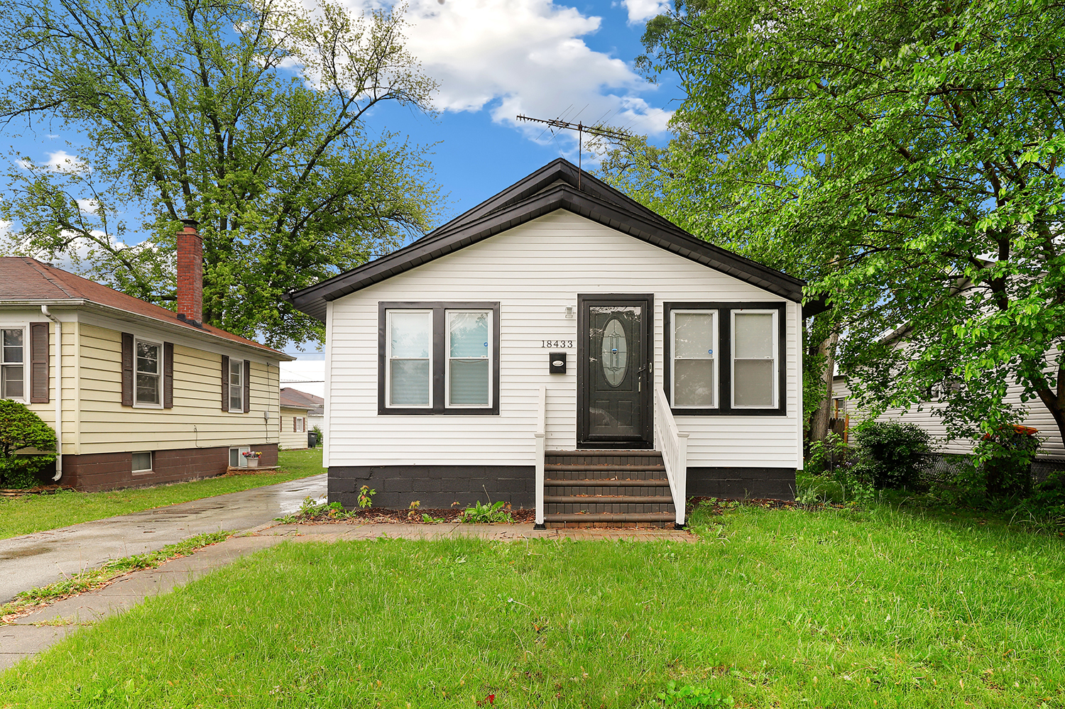18433 Ridgewood Avenue Lansing, IL 60438 - Photo 1 of 26 a view of a house with a yard