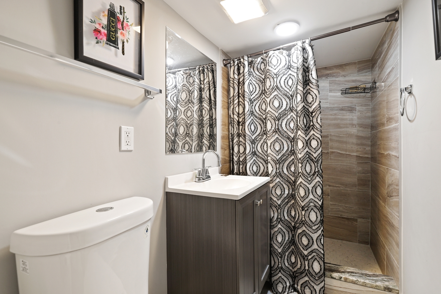 18433 Ridgewood Avenue Lansing, IL 60438 - Photo 21 of 26 a bathroom with a sink toilet and shower