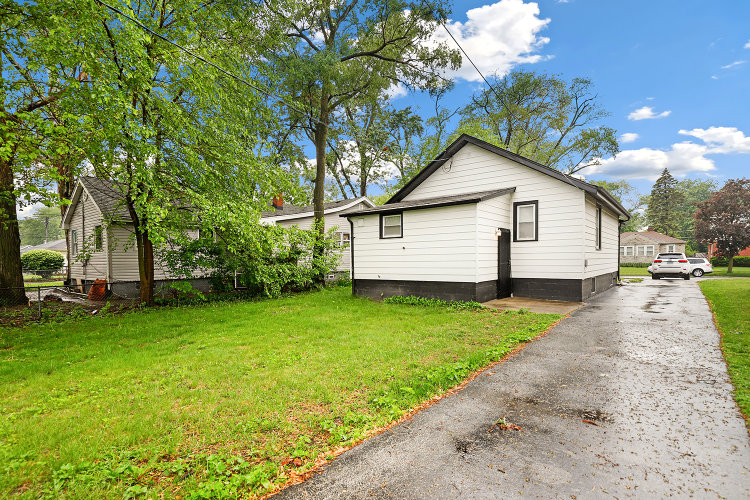 18433 Ridgewood Avenue Lansing, IL 60438 - Photo 24 of 26 a view of a backyard with a garden