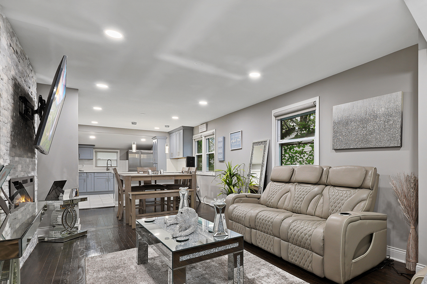 18433 Ridgewood Avenue Lansing, IL 60438 - Photo 5 of 26 a living room with furniture and a flat screen tv