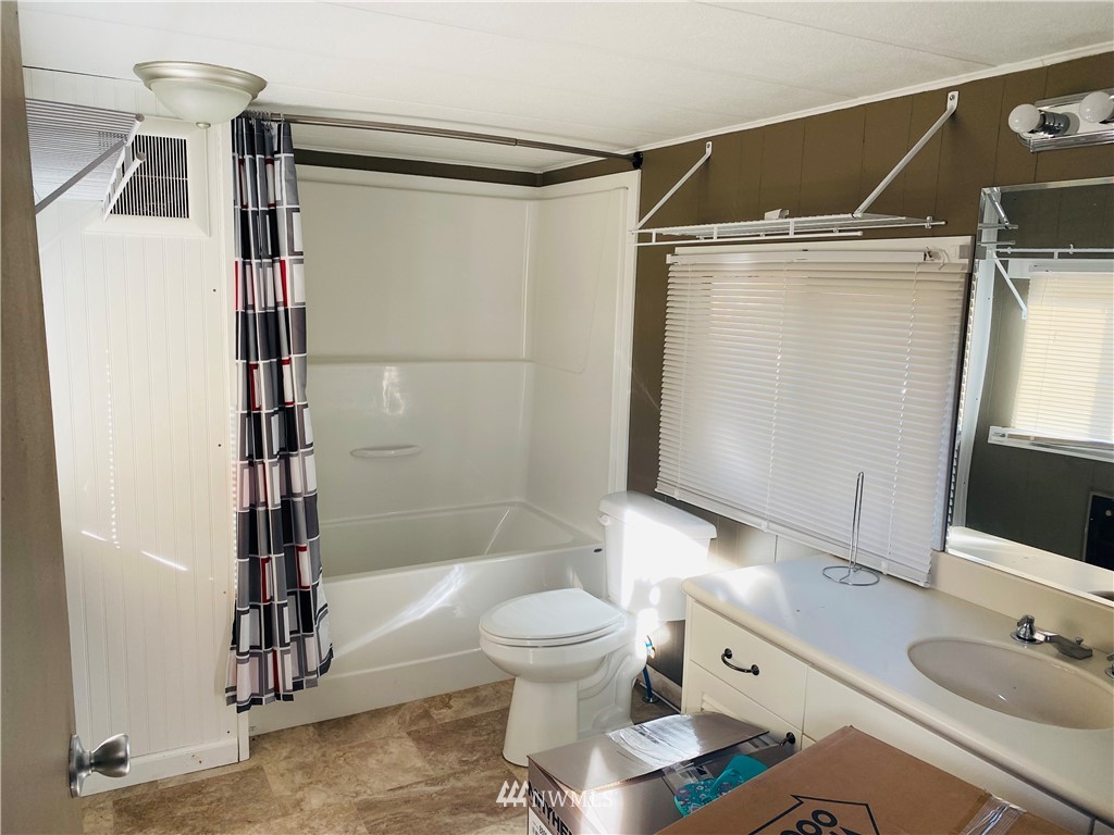 4558 Decatur Drive Ferndale, WA 98248 - Photo 15 of 20 a bathroom with a sink toilet and shower