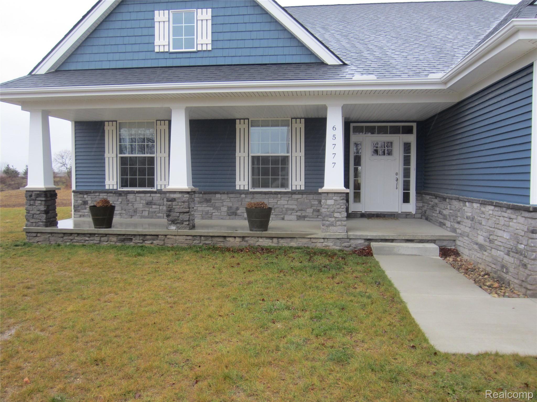 65777 Mound Road Washington, MI 48095 - Photo 2 of 45 Front Porch - Stone Pillars