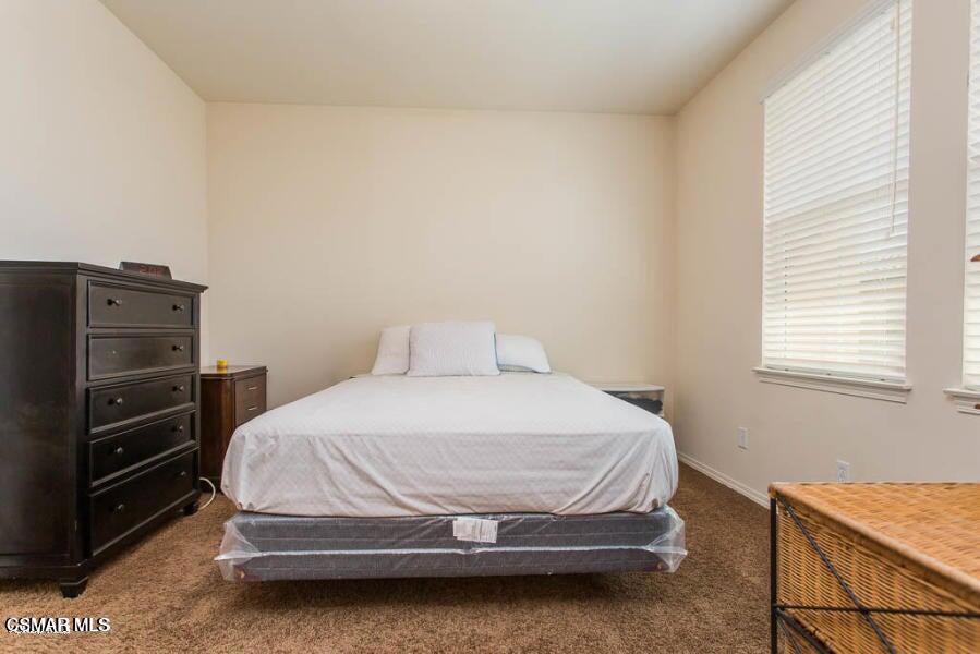 1654 Heywood Street, Unit D Simi Valley, CA 93065 - Photo 11 of 14 a bedroom with a bed and a dresser